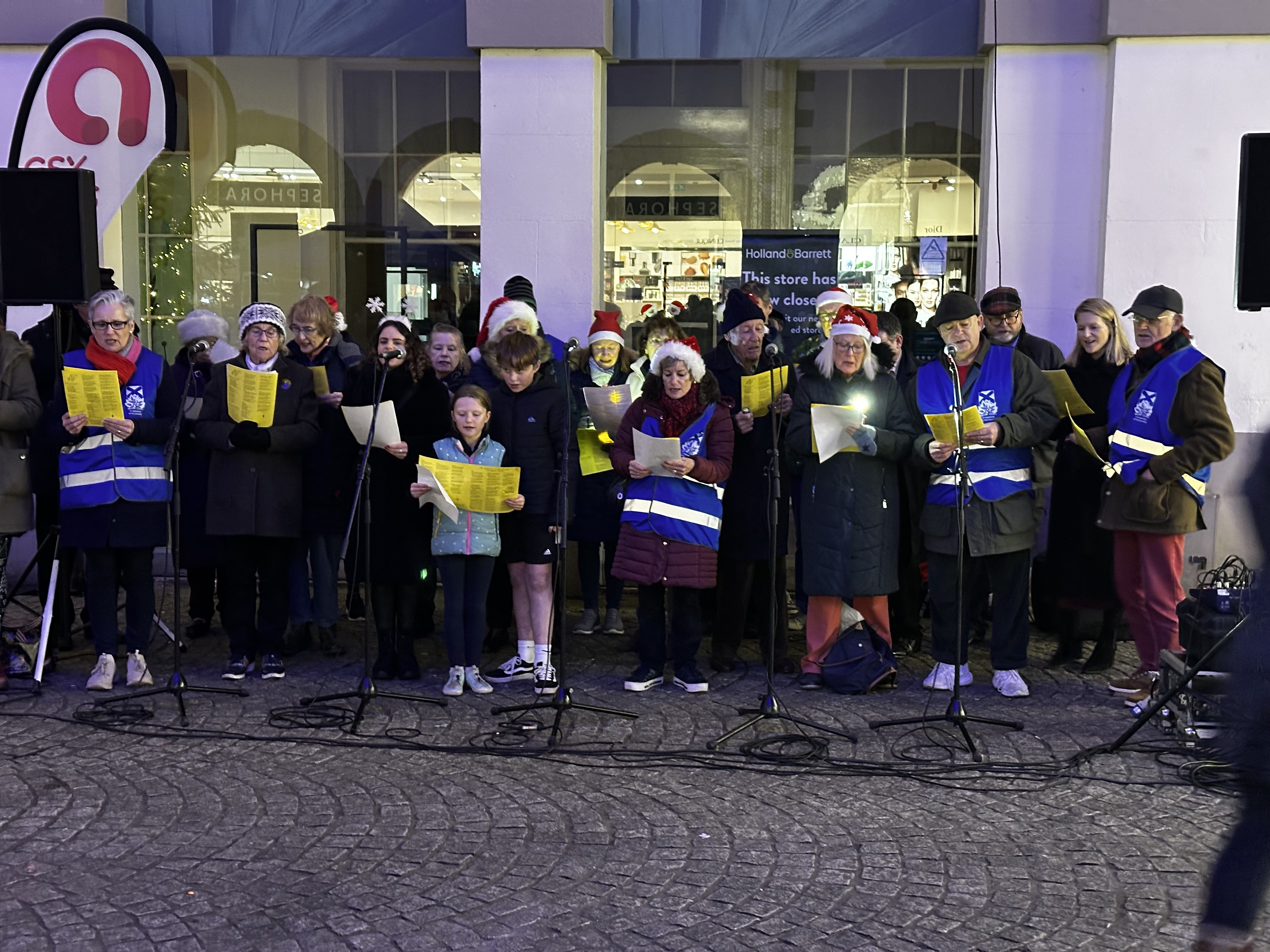 St Andrew's in the Grange Raises Voices in the Market Square for a Joyful Carol Sing 